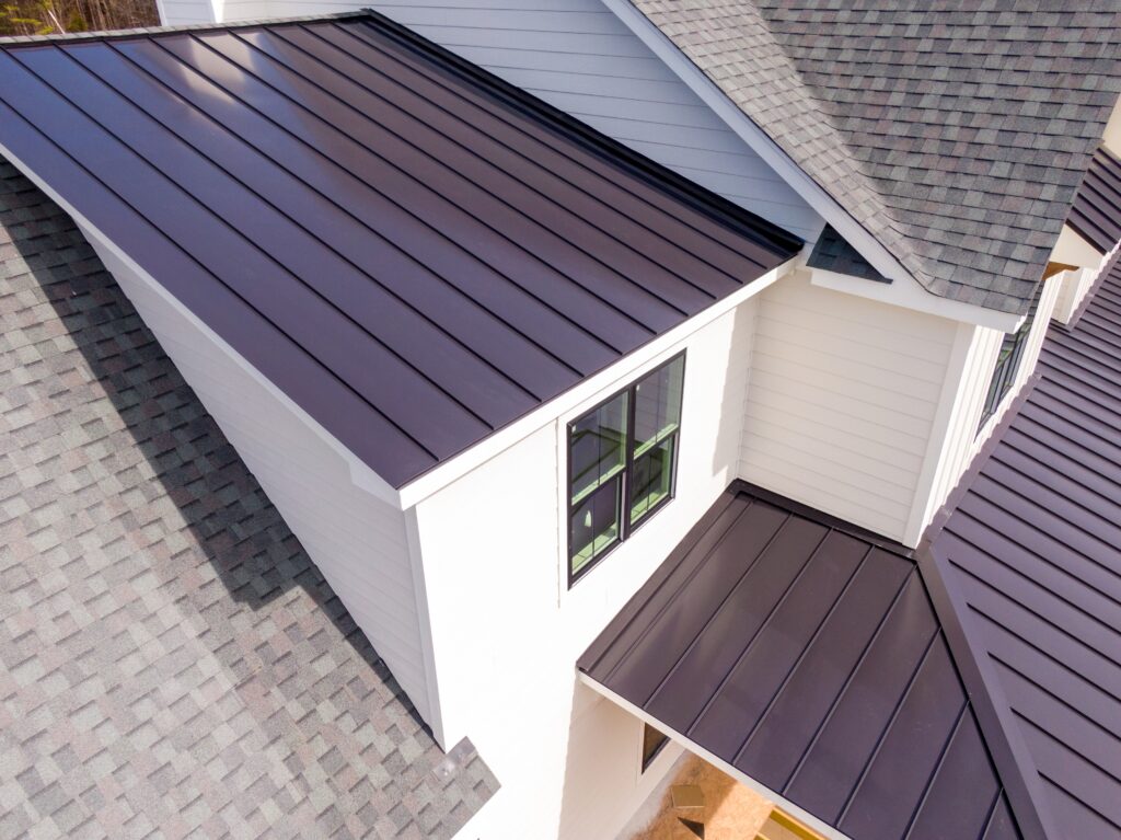 aerial view of a home with a metal roof