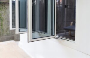 3 open casement windows