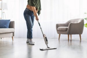 homeowner cleaning floors