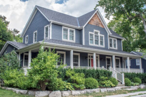 a beautiful large blue home